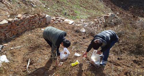 商洛学院志愿者以实际行动爱护家园